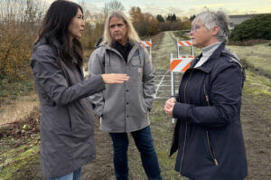 King County Councilmember Steffanie Fain, left, Kent Mayor Dana Ralph and King County Councilmember Sarah Perry meet Dec. 12 along the Green River in Tukwila. COURTESY PHOTO, King County