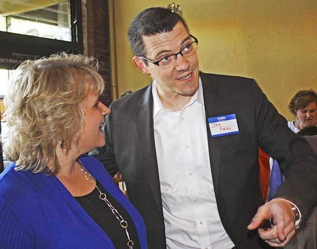 Kent mayoral candidate Dana Ralph chats with state Sen. Joe Fain