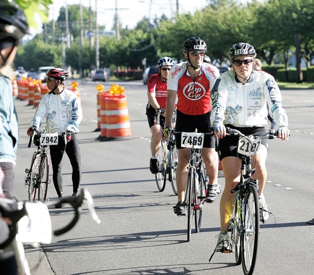 Bicyclists head through Kent during the Seattle to Portland Classic in July.