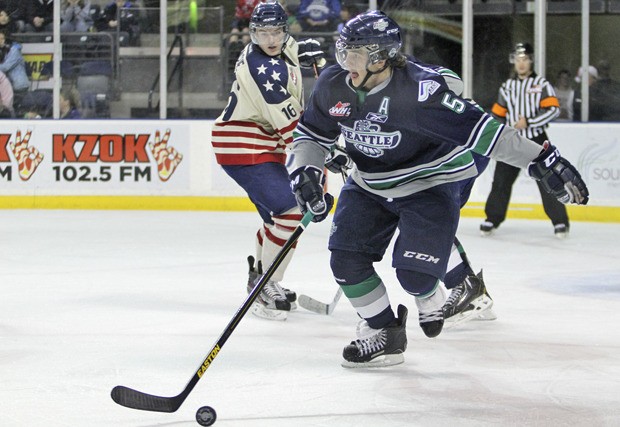 The T-Birds' Peter Forsberg pushes the puck up the ice against Tri-City.