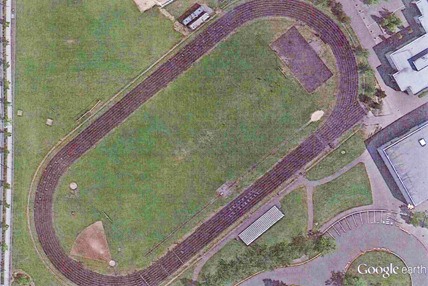 Spruce it up: A Google Earth photo shows Kentwood’s grass field and track to be renovated this summer.