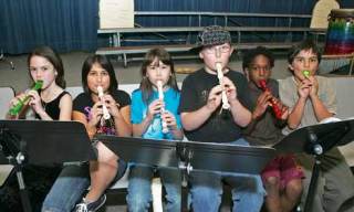 Grade-school musicians from left