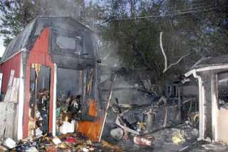 Fire destroyed two storage sheds at about 5:49 a.m. Oct. 15 next to a home in the 700 block of Second Avenue North.