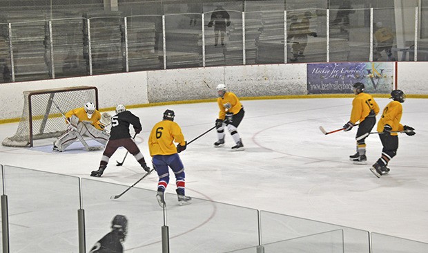 Players participate in a Seattle Ravens tryout at the Kent Valley Ice Centre.