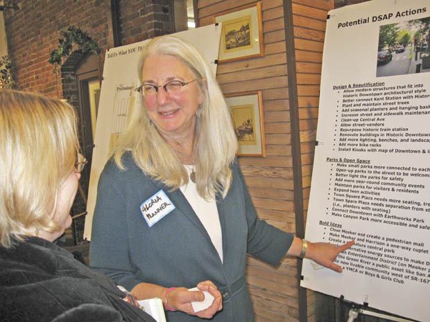 Kent City Planner Gloria Gould-Wessen hears feedback on downtown development from attendees at a recent open house.