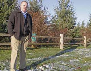 Kelly Peterson is an Environmental Engineer for the City of Kent’s Public Works Department. Peterson stands in front of the a model wetland off of 228th Street in Kent Dec. 16.