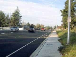 The Kent City Council reduced assessment fees for two property owners for street and other improvements along 116th Avenue Southeast near Southeast 256th Street.