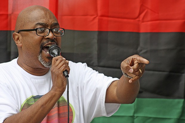 The Rev. Jimmie James speaks to the crowd during the Our Place in the March event in Kent last Sunday