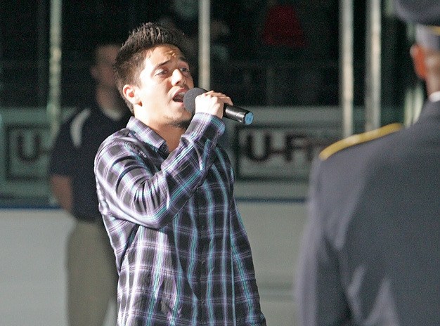 Kent's Stefano Langone sings the national anthem at the Sept. 24 Seattle Thunderbirds game at the ShoWare Center.