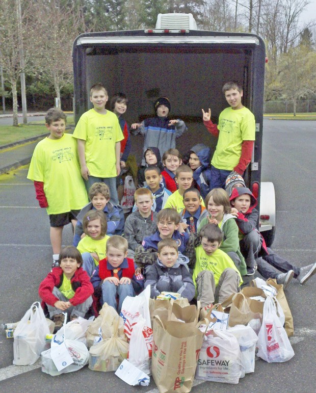 Local Cub and Boy Scouts are doing their part in collecting donations for the local food bank.