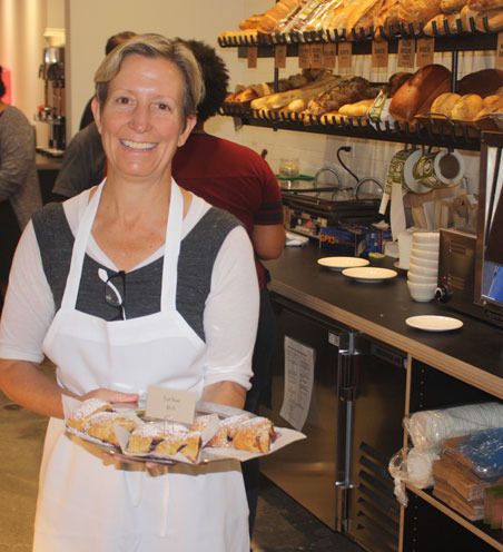 Macrina Bakery owner Leslie Mackie displays items available at the company’s new Kent headquarters