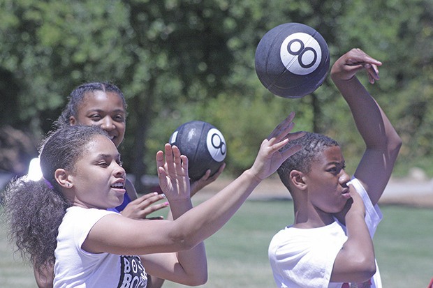 Kids take in some games at the Kent Black Action Commission's fourth annual Juneteenth celebration at Morrill Meadows Park last Saturday. The event commemorates the day