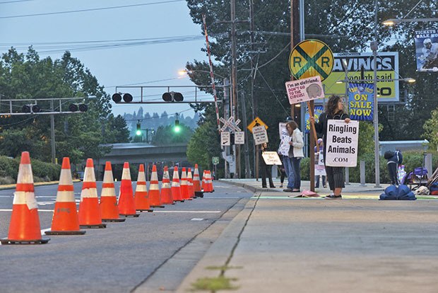 Protesters representing animal rights groups appeared along West James Street on Thursday