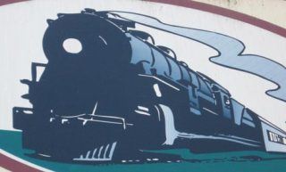 Can you name the Kent business that features this artwork in its signage? Visit the Kent Reporter Web site Thursday to learn the identity of this business.