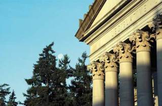 The ornate Corinthian columns of a building on the state capital campus in Olympia are a frame to the intense deliberations that will mark this year's legislative session.