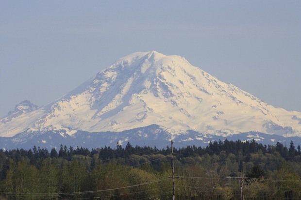 Mt. Rainier sits majestically in the sunlight.