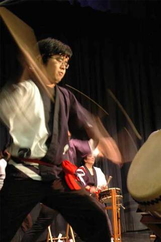A member of the Seattle Matsuri Taiko band beats his drum Saturday during the Kent-Auburn-Tamba Sister City Association fundraising banquet. The banquet drew more than 150 and raised approximately $13
