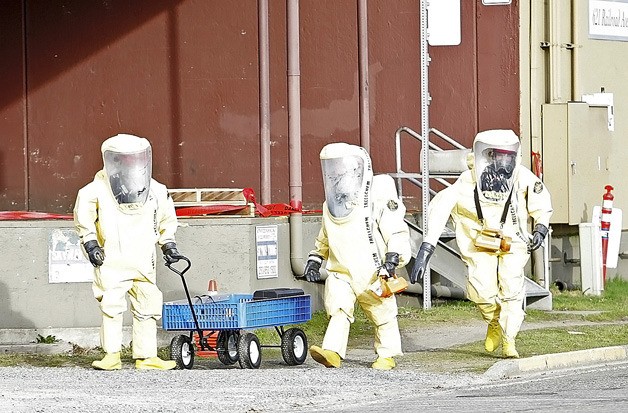 01/11/11 Kent Firefighters check for any residual ammonia after a leak Tuesday