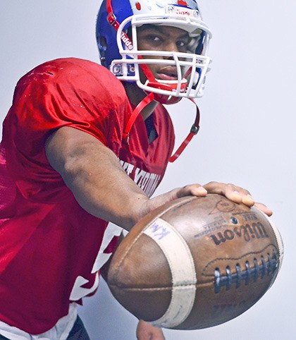Kent-Meridian's playmaking quarterback will take his skills to Central Washington University.