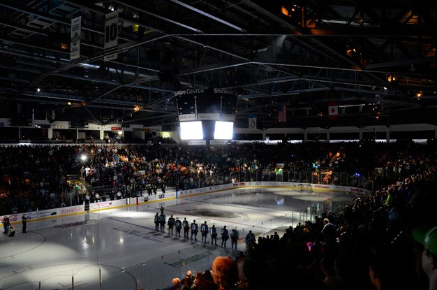 Fans attend the Seattle Thunderbirds 2013-14 home opener on Sept. 21 at the ShoWare Center in Kent.
