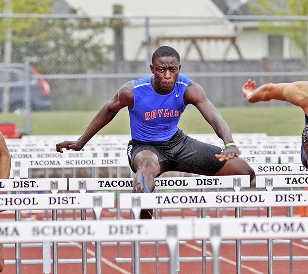 Kent-Meridian's Abu Kamara takes first in the 110m hurdles