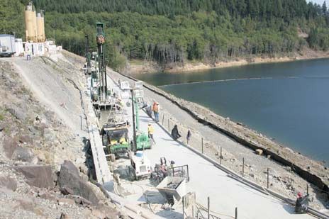 Crews work to install a temporary grout curtain last fall at the Howard Hanson Dam that helps control Green River flooding.