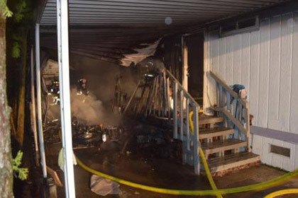 Kent Firefighters quickly doused an unoccupied mobile home early Saturday morning.