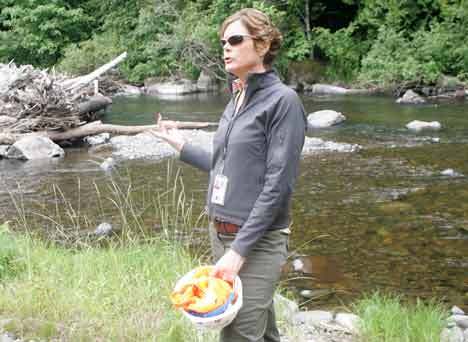 Army Corps Project Manager Mamie Brouwer describes the the purpose of the engineered log jams and the gravel supplementation July 15 along the Green River. The Army Corps of Engineers is working to rebuild salmon habitat in the watershed for the Green and Duwamish rivers.