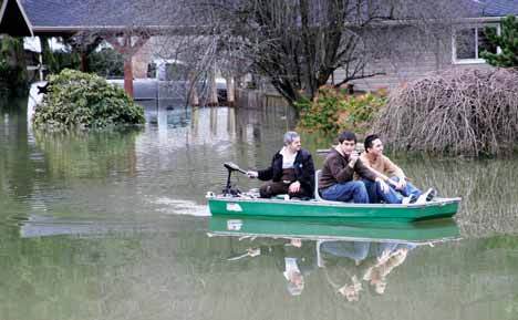Maple Valley residents boat from their home during the flooding in early 2009.