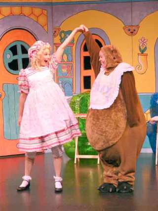 A LESSON IN FRIENDSHIP: Goldilocks (Nicole Fierstein) and Baby Bear (Amy Jo LaRubbio) share a smile during performance of Storybook Theater’s musical version of “Goldilocks and the Three Bears.” The show runs 11 a.m. and 1 p.m. Feb. 28