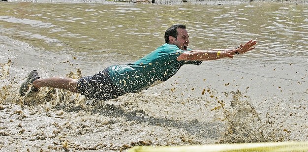 A competitor takes part in the 2011 mud dash in Kent. The Gladiator Rock'n Run is Sunday