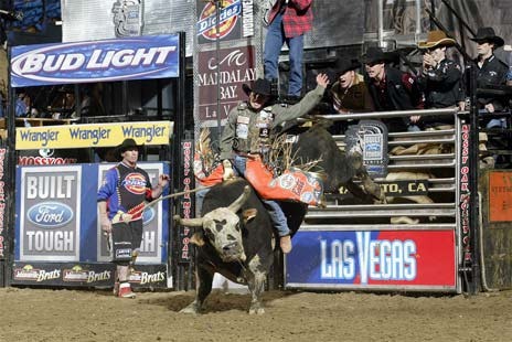 J.W. Hart rides a bull in Sacramento. The Pro Bull Riders tour hits the ShoWare Center in Kent Oct. 9-10.