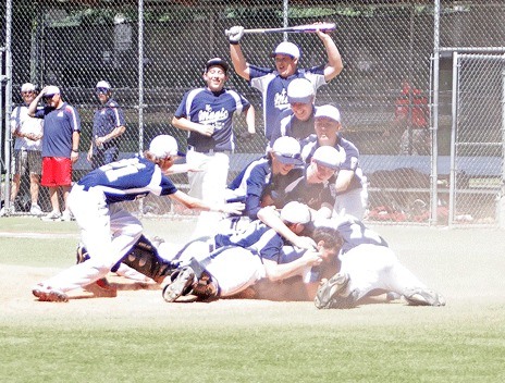 The Kent Senior Little League All-Star team (ages 14-16) celebrates its state championship on Saturday at Hartman Park in Redmond. Kent knocked off Redmond 9-4 for the title