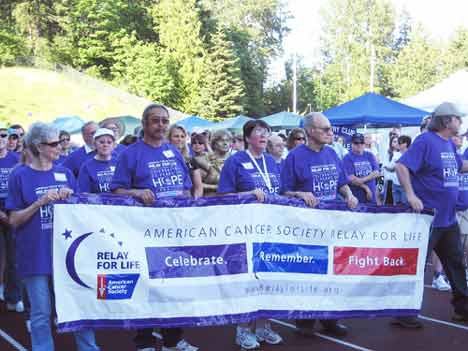 The Kent American Cancer Society Relay for Life gets under way last year at Kent's French Field. Organizers are expecting large crowds this year
