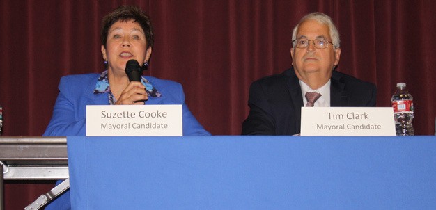 Tim Clark hopes to unseat Suzette Cooke as Kent mayor on Nov. 5.