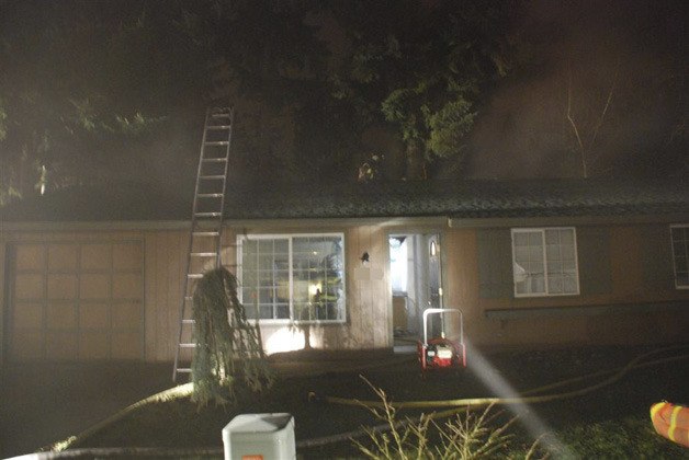 Firefighters battled a fire at this Covington home Saturday