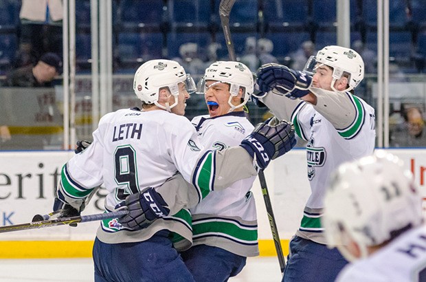 Cavin Leth and teammates celebrate after the Thunderbirds outlasted Prince George to take Game 1 of their first-round playoff series Friday night.