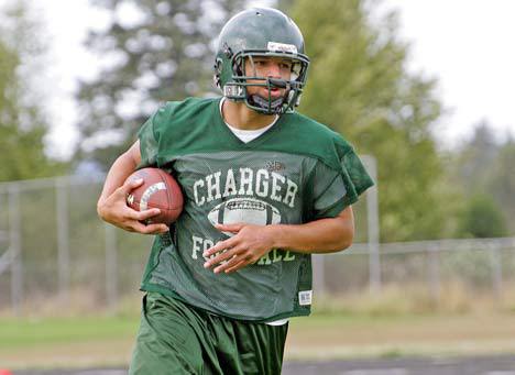 Devin Topps runs a short pitch-out route during the starting week of Kentridge football practice in August 2009.