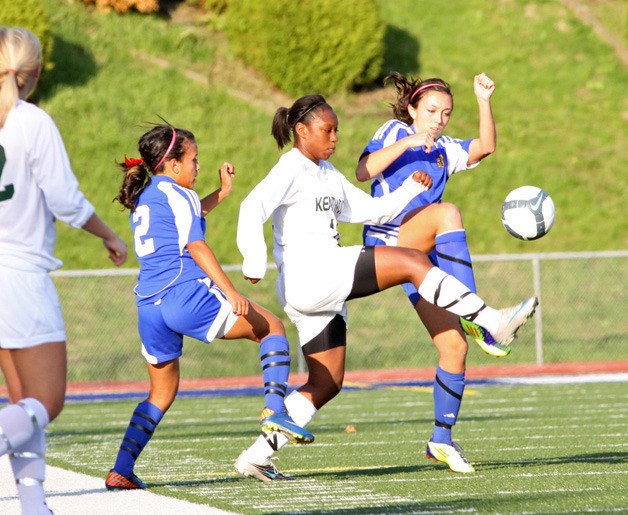 Kentwood's Mykala Benjamin fights for possesion against Tahoma's Brie Hooks
