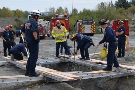 Firefighters from throughout the South King County area train in Maple Valley about how to conduct trench rescues.