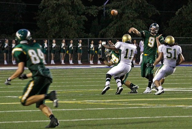 09/03/10 Kentridge quarterback Caleb Smith throws a pass to wide receiver Kevin Brown and drops it under pressure against Auburn at French Field Friday