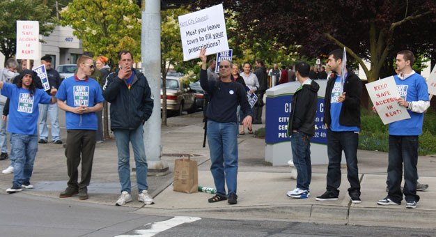 Protestors line up outside Kent City Hall last year against a proposed ban on medical marijuana collective gardens. The City Council voted 4-3 to adopt the ban.