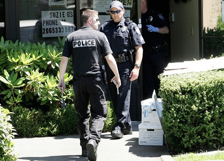 The city of Kent would hire six police officers in 2014 under a budget ordinance that goes before the City Council on Tuesday