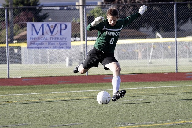 Kentwood's Chris Kubeja winds up for a kick during a playoff game in 2011.