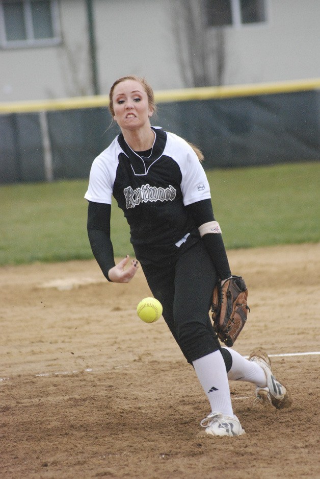 Kentwood's Bethany Pfaff pitches during a SPSL North game in 2011 against Auburn Riverside. She is one of a core of seniors returning to the team this season.