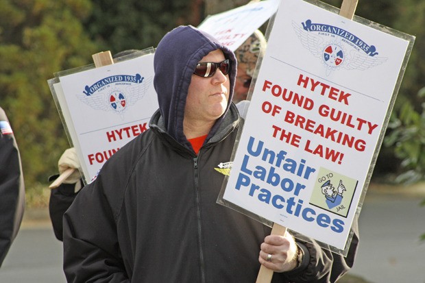 Brian Ball and machinists formed an informational picket line Monday afternoon at Kent's Hytek Finishes to show support for the company's employees during an ongoing contract talks.