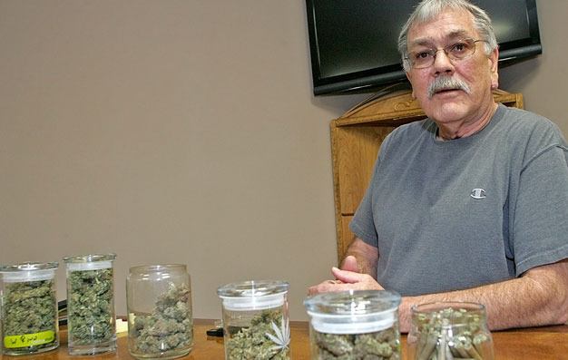 Charles Lambert operates Evergreen Association of Collective Gardens in Kent. City officials say his business violates the city's ban against marijuana collective gardens.