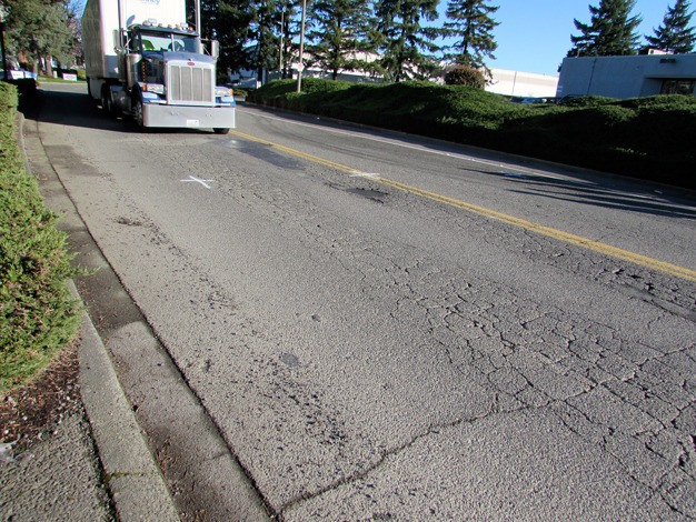 This section of 80th Avenue South shows the type of cracking that Kent residents want the city to repair.