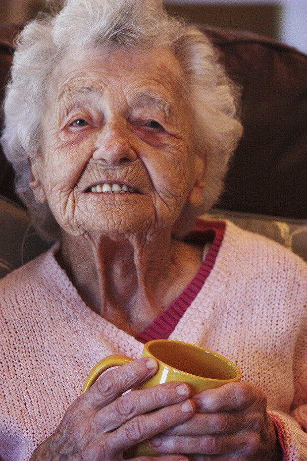 Coffee talk: Irma Morrison enjoys a cup of coffee while telling stories about her life on her 106th birthday last Friday.