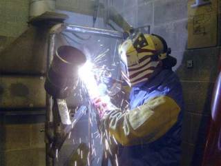 Veteran Enrique Rosano demonstrates a welding technique at the Seattle Area Pipe Trades Education Center in Renton. Rosano is a member of the Veterans In Piping program.